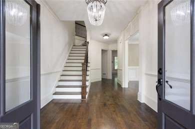 Welcome to 6186 Talmadge Run-an elegant retreat tucked inside on The Governors Towne Club in Georgia - for sale on GolfHomes.com, golf home, golf lot