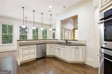 Welcome to 6186 Talmadge Run-an elegant retreat tucked inside on The Governors Towne Club in Georgia - for sale on GolfHomes.com, golf home, golf lot