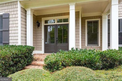 Welcome to 6186 Talmadge Run-an elegant retreat tucked inside on The Governors Towne Club in Georgia - for sale on GolfHomes.com, golf home, golf lot