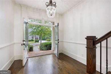 Welcome to 6186 Talmadge Run-an elegant retreat tucked inside on The Governors Towne Club in Georgia - for sale on GolfHomes.com, golf home, golf lot
