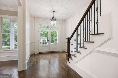 Welcome to 6186 Talmadge Run-an elegant retreat tucked inside on The Governors Towne Club in Georgia - for sale on GolfHomes.com, golf home, golf lot