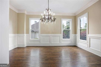Welcome to 6186 Talmadge Run-an elegant retreat tucked inside on The Governors Towne Club in Georgia - for sale on GolfHomes.com, golf home, golf lot