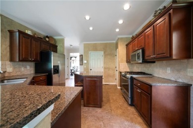 Beautifully situated on a private golf course lot, this stunning on Trophy Club of Apalachee in Georgia - for sale on GolfHomes.com, golf home, golf lot