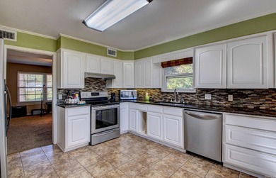 This spacious home in Foxwood offers 3 bedrooms and 3 1/2  baths on Foxwood Golf Club in Arkansas - for sale on GolfHomes.com, golf home, golf lot