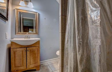 This spacious home in Foxwood offers 3 bedrooms and 3 1/2  baths on Foxwood Golf Club in Arkansas - for sale on GolfHomes.com, golf home, golf lot