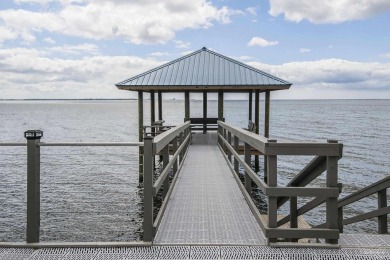 Water views, open living spaces and attention to detail shine in on Pensacola Country Club in Florida - for sale on GolfHomes.com, golf home, golf lot