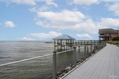 Water views, open living spaces and attention to detail shine in on Pensacola Country Club in Florida - for sale on GolfHomes.com, golf home, golf lot