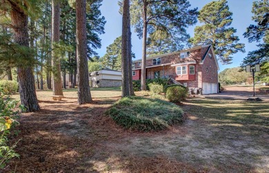 This spacious home in Foxwood offers 3 bedrooms and 3 1/2  baths on Foxwood Golf Club in Arkansas - for sale on GolfHomes.com, golf home, golf lot
