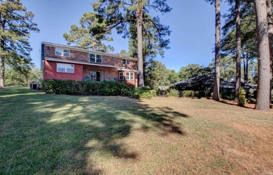 This spacious home in Foxwood offers 3 bedrooms and 3 1/2  baths on Foxwood Golf Club in Arkansas - for sale on GolfHomes.com, golf home, golf lot