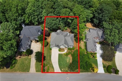 Beautifully situated on a private golf course lot, this stunning on Trophy Club of Apalachee in Georgia - for sale on GolfHomes.com, golf home, golf lot