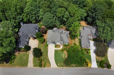 Beautifully situated on a private golf course lot, this stunning on Trophy Club of Apalachee in Georgia - for sale on GolfHomes.com, golf home, golf lot
