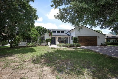 Discover comfort and privacy in this charming and updated on Rio Pinar Golf and Country Club in Florida - for sale on GolfHomes.com, golf home, golf lot