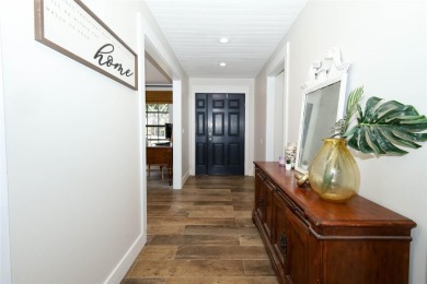 Discover comfort and privacy in this charming and updated on Rio Pinar Golf and Country Club in Florida - for sale on GolfHomes.com, golf home, golf lot