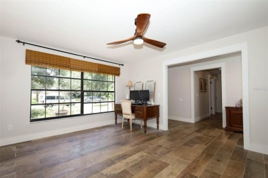 Discover comfort and privacy in this charming and updated on Rio Pinar Golf and Country Club in Florida - for sale on GolfHomes.com, golf home, golf lot
