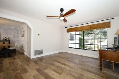 Discover comfort and privacy in this charming and updated on Rio Pinar Golf and Country Club in Florida - for sale on GolfHomes.com, golf home, golf lot