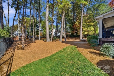 Immaculate home on a quiet street in the coveted Peninsula on The Peninsula Club in North Carolina - for sale on GolfHomes.com, golf home, golf lot