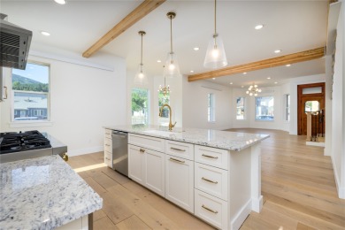 Discover luxury living in this meticulously renovated 4 bed, 2.5 on The Old Works Golf Course in Montana - for sale on GolfHomes.com, golf home, golf lot