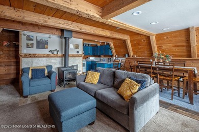 Nestled among a serene canopy of mature trees, this charming on Star Valley RV Golf Course in Wyoming - for sale on GolfHomes.com, golf home, golf lot