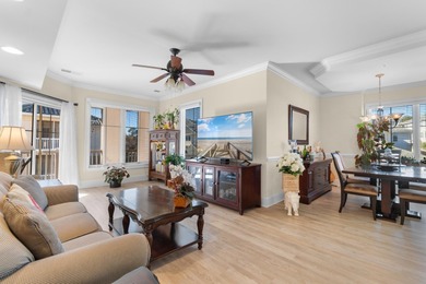 Sunlight pours into this bright, open 3-bedroom, 2-bath end-unit on Barefoot Resort and Golf Club  in South Carolina - for sale on GolfHomes.com, golf home, golf lot