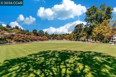 Lower level SIERRA condo in sought after lagoon entry E1 on Rossmoor Golf Course in California - for sale on GolfHomes.com, golf home, golf lot