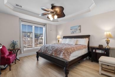 Sunlight pours into this bright, open 3-bedroom, 2-bath end-unit on Barefoot Resort and Golf Club  in South Carolina - for sale on GolfHomes.com, golf home, golf lot