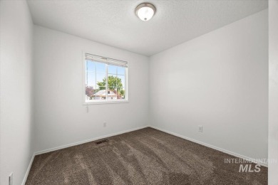 Welcome to this beautifully updated 3-bedroom, 2.5-bath home on Centennial Golf Course in Idaho - for sale on GolfHomes.com, golf home, golf lot