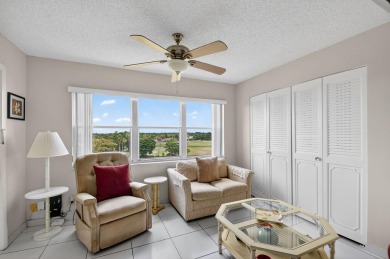 Penthouse views in this 1 BR, 1.5 BA with Den that can be used on Poinciana Golf Club in Florida - for sale on GolfHomes.com, golf home, golf lot