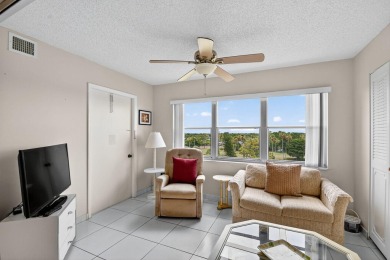 Penthouse views in this 1 BR, 1.5 BA with Den that can be used on Poinciana Golf Club in Florida - for sale on GolfHomes.com, golf home, golf lot