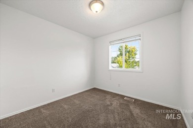Welcome to this beautifully updated 3-bedroom, 2.5-bath home on Centennial Golf Course in Idaho - for sale on GolfHomes.com, golf home, golf lot