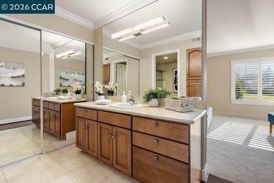 Lower level SIERRA condo in sought after lagoon entry E1 on Rossmoor Golf Course in California - for sale on GolfHomes.com, golf home, golf lot