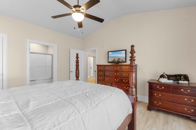 Sunlight pours into this bright, open 3-bedroom, 2-bath end-unit on Barefoot Resort and Golf Club  in South Carolina - for sale on GolfHomes.com, golf home, golf lot