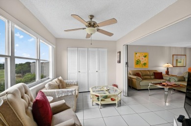 Penthouse views in this 1 BR, 1.5 BA with Den that can be used on Poinciana Golf Club in Florida - for sale on GolfHomes.com, golf home, golf lot