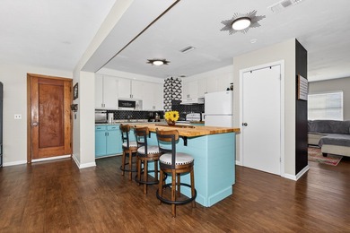 Beautifully renovated Florida cottage packed with coastal charm on Saint Josephs Bay Country Club in Florida - for sale on GolfHomes.com, golf home, golf lot