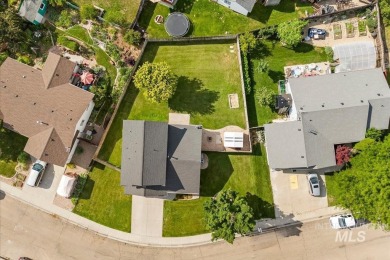 Welcome to this beautifully updated 3-bedroom, 2.5-bath home on Centennial Golf Course in Idaho - for sale on GolfHomes.com, golf home, golf lot
