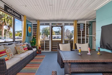 Beautifully renovated Florida cottage packed with coastal charm on Saint Josephs Bay Country Club in Florida - for sale on GolfHomes.com, golf home, golf lot