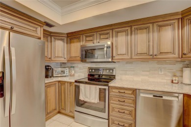 PRICED TO SELL - Welcome home, where comfort meets elegance in on Bayou Golf Club in Florida - for sale on GolfHomes.com, golf home, golf lot