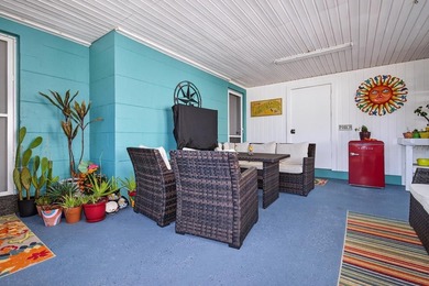 Beautifully renovated Florida cottage packed with coastal charm on Saint Josephs Bay Country Club in Florida - for sale on GolfHomes.com, golf home, golf lot