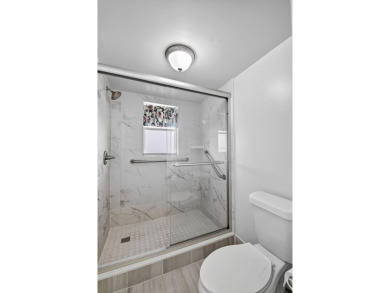 Penthouse views in this 1 BR, 1.5 BA with Den that can be used on Poinciana Golf Club in Florida - for sale on GolfHomes.com, golf home, golf lot
