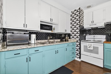 Beautifully renovated Florida cottage packed with coastal charm on Saint Josephs Bay Country Club in Florida - for sale on GolfHomes.com, golf home, golf lot