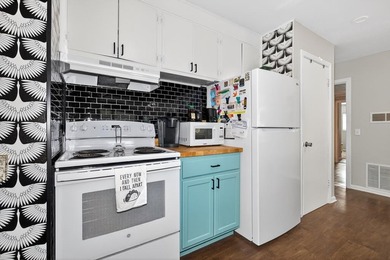 Beautifully renovated Florida cottage packed with coastal charm on Saint Josephs Bay Country Club in Florida - for sale on GolfHomes.com, golf home, golf lot