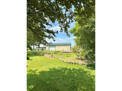 Country like setting on a hard surface road, minutes from town on Prairie View Golf and Grill in Iowa - for sale on GolfHomes.com, golf home, golf lot