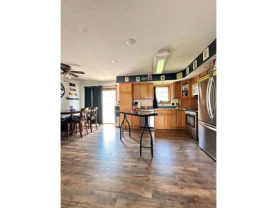 Country like setting on a hard surface road, minutes from town on Prairie View Golf and Grill in Iowa - for sale on GolfHomes.com, golf home, golf lot
