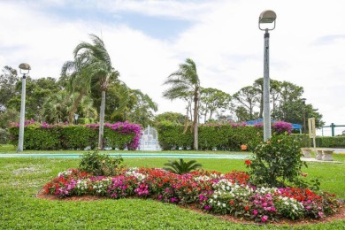 Penthouse views in this 1 BR, 1.5 BA with Den that can be used on Poinciana Golf Club in Florida - for sale on GolfHomes.com, golf home, golf lot