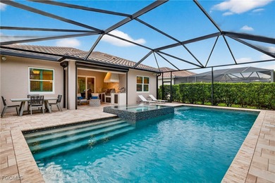 This beauty is stacked with LUXURY UPGRADES! Outdoor kitchen on The Plantation Golf and Country Club in Florida - for sale on GolfHomes.com, golf home, golf lot