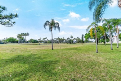 Penthouse views in this 1 BR, 1.5 BA with Den that can be used on Poinciana Golf Club in Florida - for sale on GolfHomes.com, golf home, golf lot