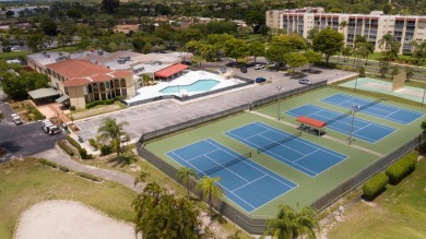 Penthouse views in this 1 BR, 1.5 BA with Den that can be used on Poinciana Golf Club in Florida - for sale on GolfHomes.com, golf home, golf lot