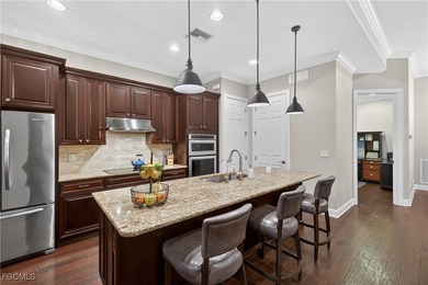 This beauty is stacked with LUXURY UPGRADES! Outdoor kitchen on The Plantation Golf and Country Club in Florida - for sale on GolfHomes.com, golf home, golf lot