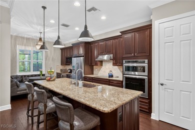 This beauty is stacked with LUXURY UPGRADES! Outdoor kitchen on The Plantation Golf and Country Club in Florida - for sale on GolfHomes.com, golf home, golf lot