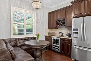 This beauty is stacked with LUXURY UPGRADES! Outdoor kitchen on The Plantation Golf and Country Club in Florida - for sale on GolfHomes.com, golf home, golf lot