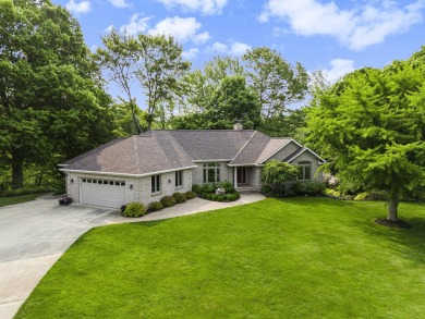 Experience the best of both worlds in this beautifully appointed on HawksHead Links in Michigan - for sale on GolfHomes.com, golf home, golf lot
